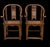 In the Ming style. A wonderful pair of antique carved Chinese chairs. Made of mixed woods finely carved horseshoe back...