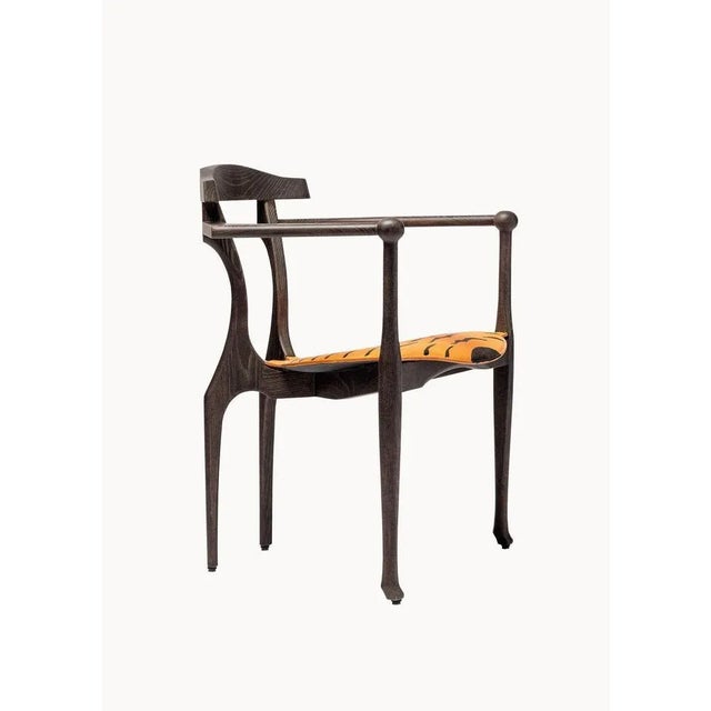 Tiger art gaulino limited edition armchair by oscar tusquets chair in ash wood with dark stained and varnished patina and...