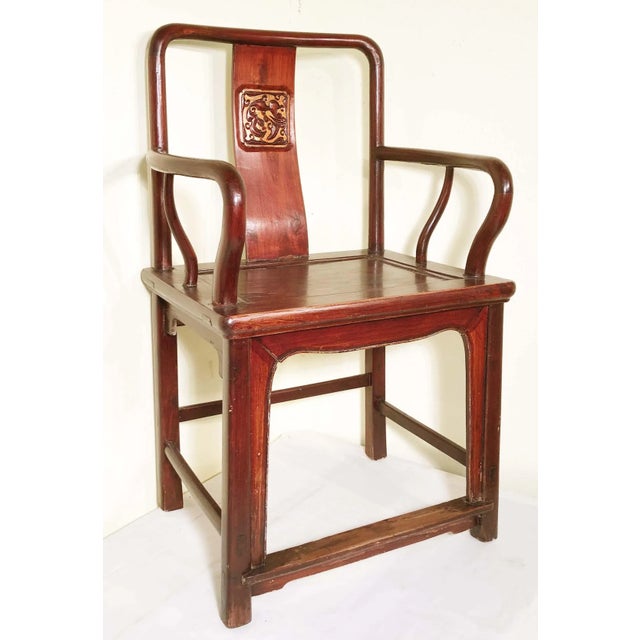 This pair of Antique Chinese Arm Chairs is made in elegant Ming style. Traditional Chinese "dragon" design ornately carved...