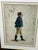 A charming and finely executed 19th-century French watercolor, depicting a young boy in profile dressed in a traditional...