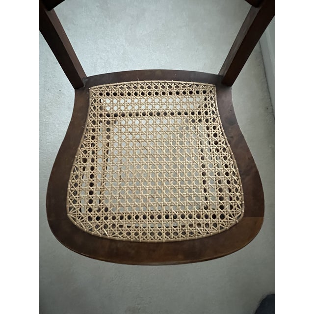 Beautiful matched set of 6 antique turned‑wood dining chairs (armless side chairs) with woven cane seats. Four chairs have...