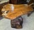 Solid wood carved table, crafted from a single piece of wood. Its organically shaped, natural tabletop and root-like...