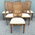 Vintage set of six dining chairs by Chaircraft featuring warm faux bamboo frames and beautifully woven cane backs. The set...