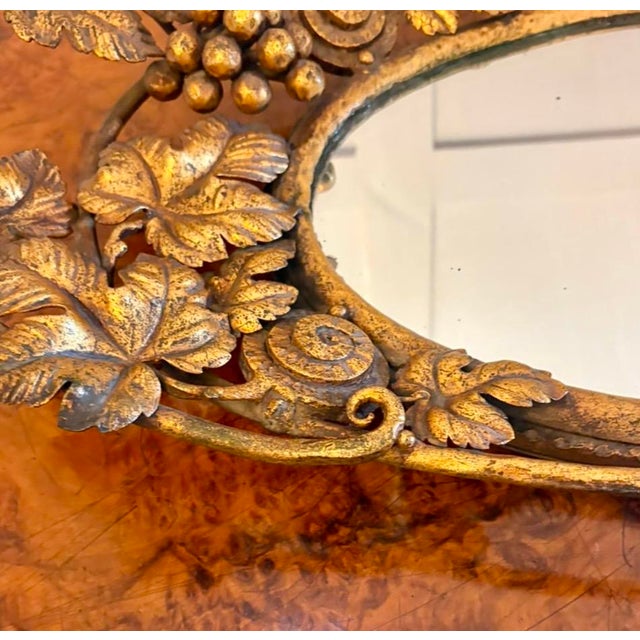 A highly decorative antique Edwardian gilt metal and mirrored drinks serving tray dating to circa 1900. This unusual tray...