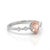 This stunning ring features a soft, blush-toned morganite gemstone, celebrated for its delicate peach-pink hue and...