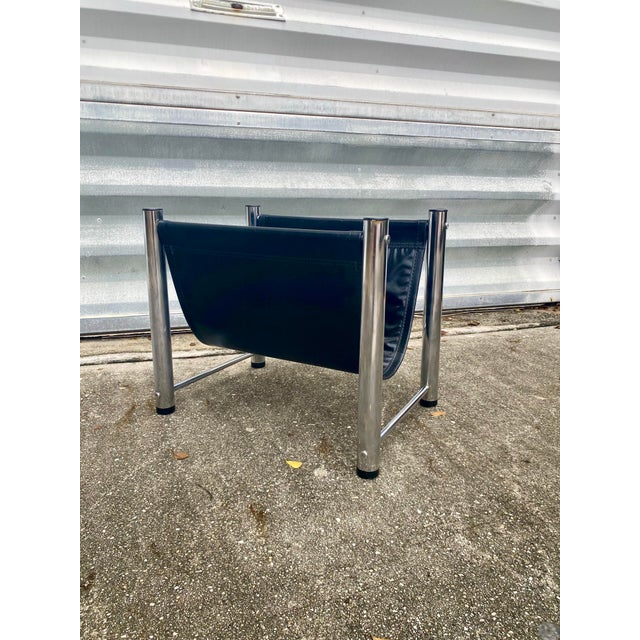 70s Milo Baughman Style Rack Magazine, Chrome frame and vinyl sling to hold magazine.