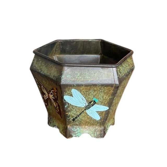 Bring a touch of whimsical garden charm indoors or to a covered patio with this delightful vintage hexagonal metal...