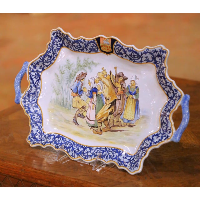 Dress a kitchen wall, dining room, or French country vignette with this elegant hand-painted faience platter, crafted in...