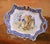 Dress a kitchen wall, dining room, or French country vignette with this elegant hand-painted faience platter, crafted in...