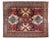 Hand-knotted wool rug from the 20th century. The composition is dominated by a distinctive stepped medallion surrounded by...