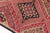 This is a vintage Turkish Oushak rug from the Mid 20th Century. The piece was hand-knotted.