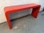 Make a bold statement with this iconic 1980s post-modern console table. Featuring a classic minimalist waterfall...