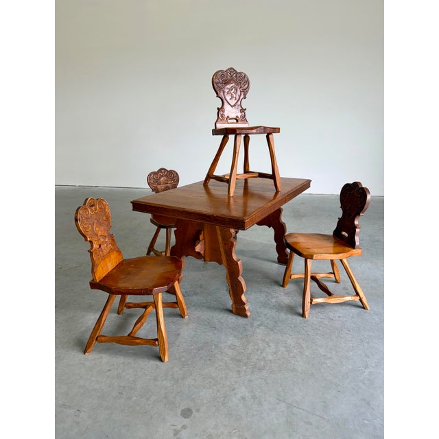 Vintage Brutalist Pine German Swiss Alpine Folk Art Tyrolean Hand Carved Dining Chairs. Pegged joints and detailed carved...
