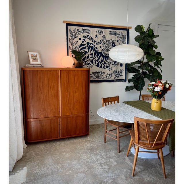 Mid century Danish tambour cabinet that I am looking to sell. It is made by Laurits M Larsen. The dimensions are...