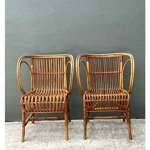 Crafted in the 1940s, this pair of lounge chairs exemplifies the elegant design sensibilities of Tove Kindt Larsen for...
