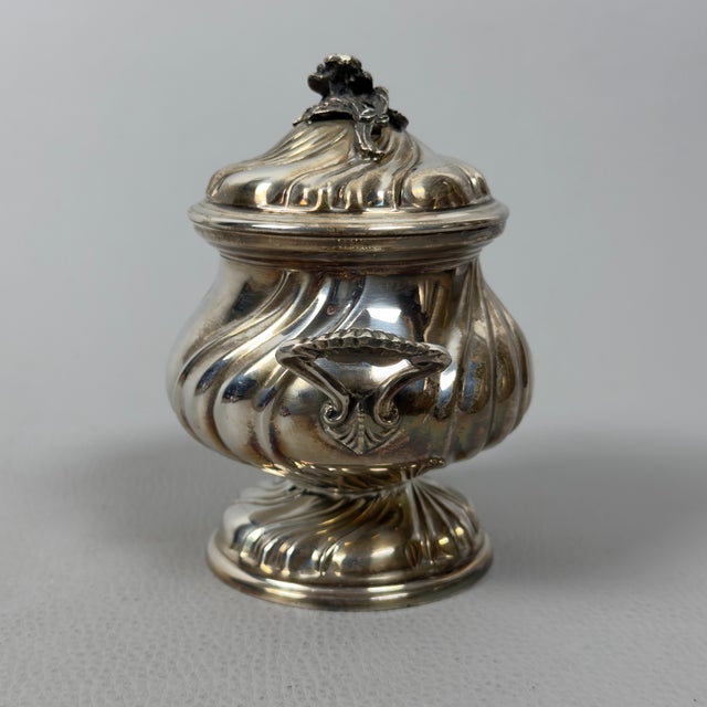 A splendid solid silver sugar bowl of high-quality Italian craftsmanship, dating back to the 1970s. A significant and...