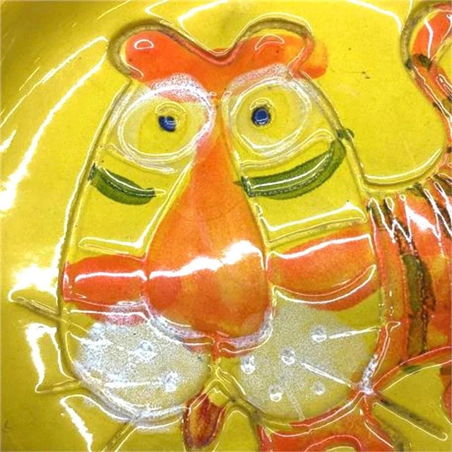 An oversized midcentury Tiger ashtray, signed B. Walsh (Bennett Walsh), dated 1973. Made of stoneware and showing an...