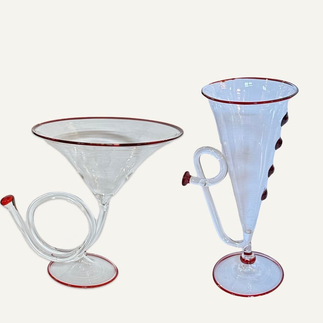 These glass horns were originally designed in the 1940s by Italian designer Piero Fornasetti and produced by Venini in...