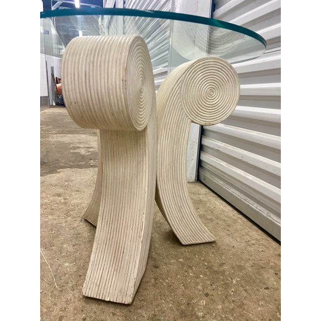 1980s Pencil Reed Rattan Side Table. split reed" construction, features thin strips of rattan bundled together to create...