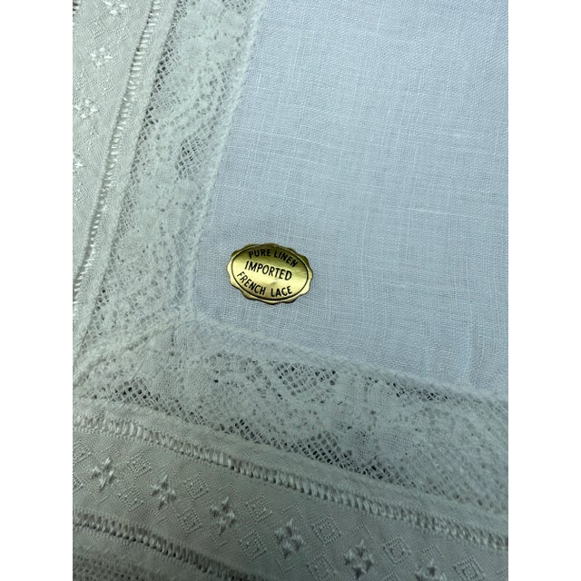 Offering a beautiful matching pair of pure linen handkerchiefs with French lace border. These are vintage mid-20th century...