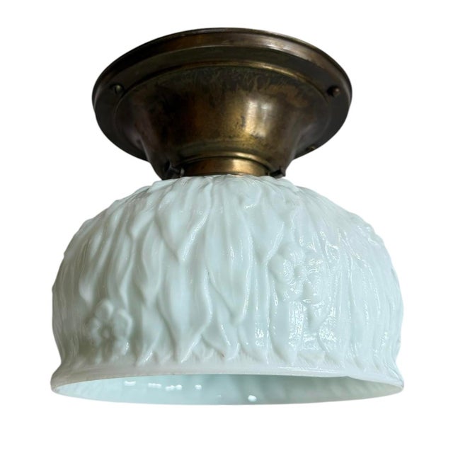 Such a charming light fixture. Perfect for rooms or hallways with lower ceilings. The light fixture, circa 1930’s is a...