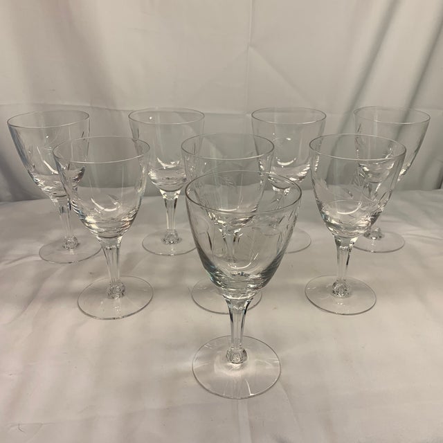 Elevate your next tablescape or intimate gathering with this exquisite set of eight vintage cut crystal wine glasses....