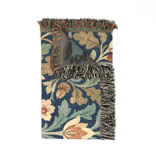 This Arts & Crafts woodland hares woven throw blanket features caramel-colored hares, sage green acanthus foliage, ivory...