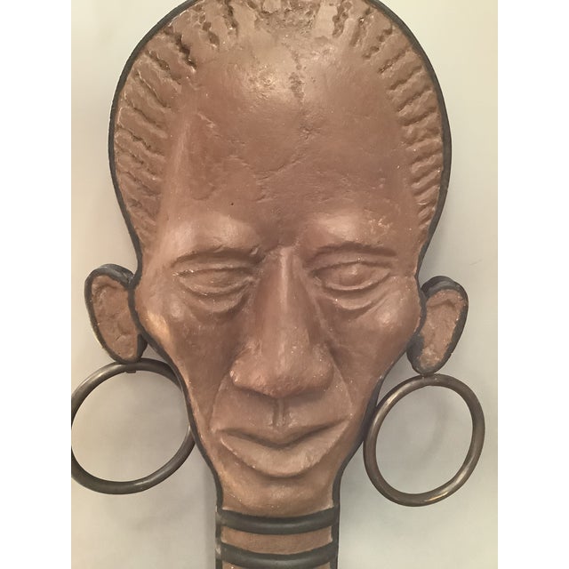 This is a fabulous and very rare handcrafted African head lamp made in 1955 and signed by the artist Goodwin. I only found...
