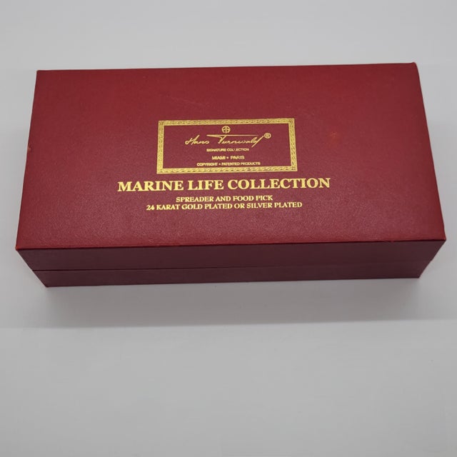 Hans Turnwald Signature Collection Marine Life spreader and food pick set features stunning blue frosted glass seahorse...