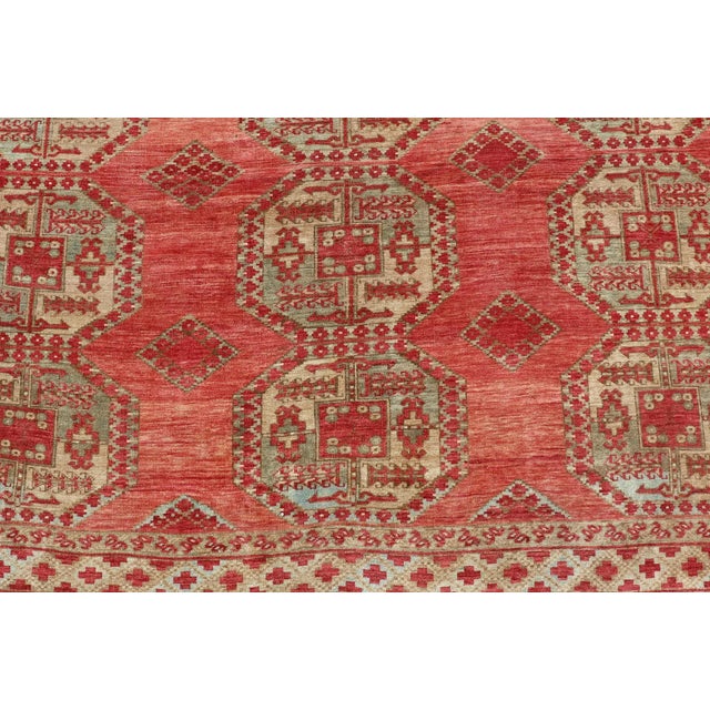 Red Early 20th Century Antique Turkomen Ersari Rug With Repeating Gul Design 8'3 X 11'4 For Sale - Image 8 of 13