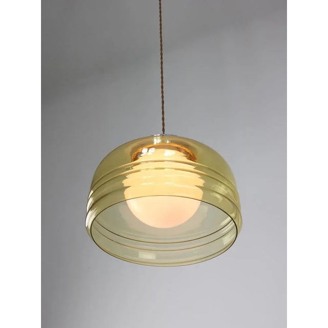 Total height of the lamp is adjustable, length of the cable alone is 140cm and can be shortened to your preference. Takes...