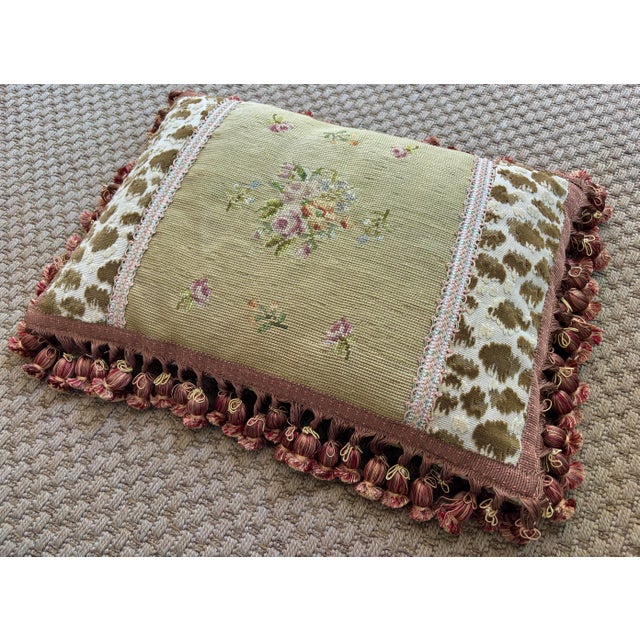 Pretty vintage Aubusson-style needlepoint pillow with pom pom trim and leopard spotted accent. Please see condition...