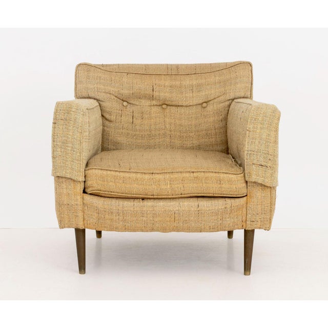 Edward Wormley for Dunbar Upholstered Arm Chair, with tan and green woven wool upholstery mounted on four brass tapered...