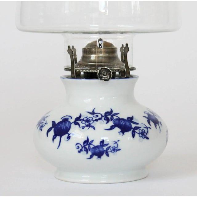 Vintage blue and white Fine Bavarian Porcelain kerosene oil lamp. Made in West Germany by Lamp Light Farms. Makers mark on...