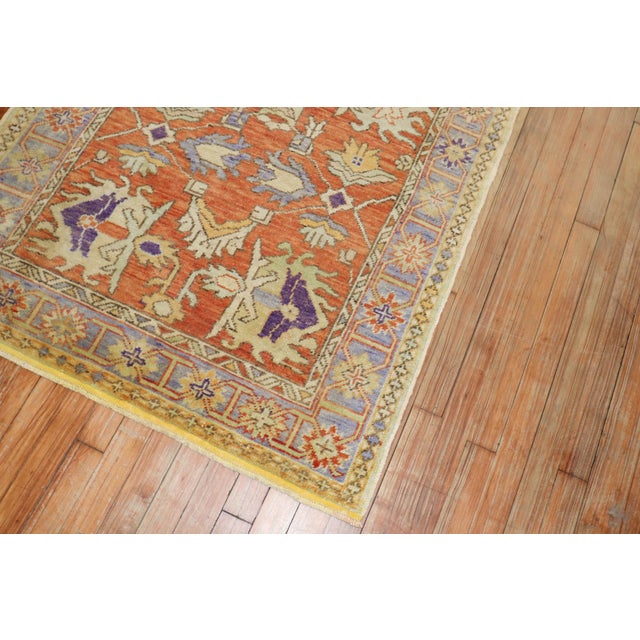 Mid 20th Century Turkish scatter size Rug with a large all-over design on a orange ground. 1 end has some yellow...