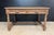 A French Carved Oak Desk or Centre Table, dating to the mid 19th Century and having 2 drawers to the front. It is carved...