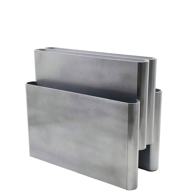 Minimalist four-compartment magazine rack designed by Giotto Stoppino for Kartell and first introduced in 1972. Made in...