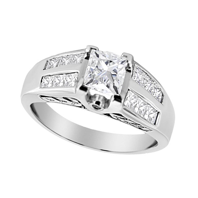 Adorn yourself with this bold 14k white gold ring. A sparkling 3/4 cttw princess-cut diamond sits at the center of this...
