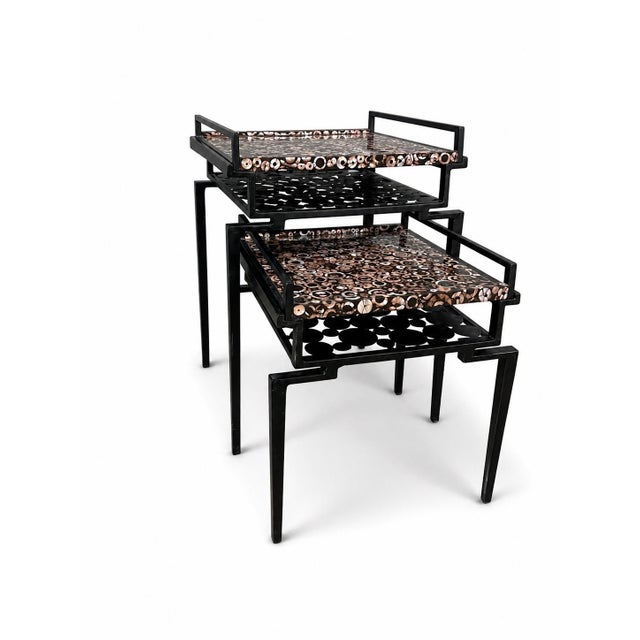 Rare set of R & Y Augousti nesting tables in excellent vintage condition. A refined set of nesting tables by Parisian...