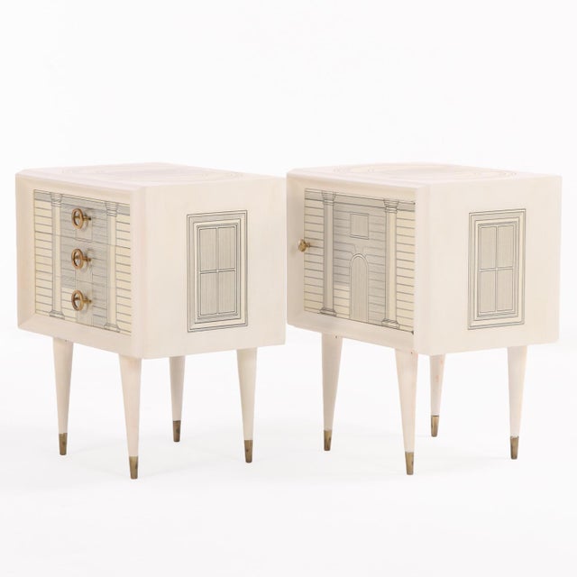 This pair of painted wood nightstands are each adorned on tops, sides and fronts with architectural rendering designs in...