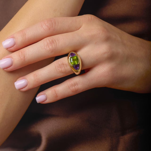 This striking vintage ring by David Yurman is a vibrant expression of bold color and sculptural design, showcasing the...