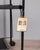 Black metal TV stand, "Teulada" model, designed by Lluis Clotet and Oscar Tusquets Blanca for Zanotta, 1990s. This piece...