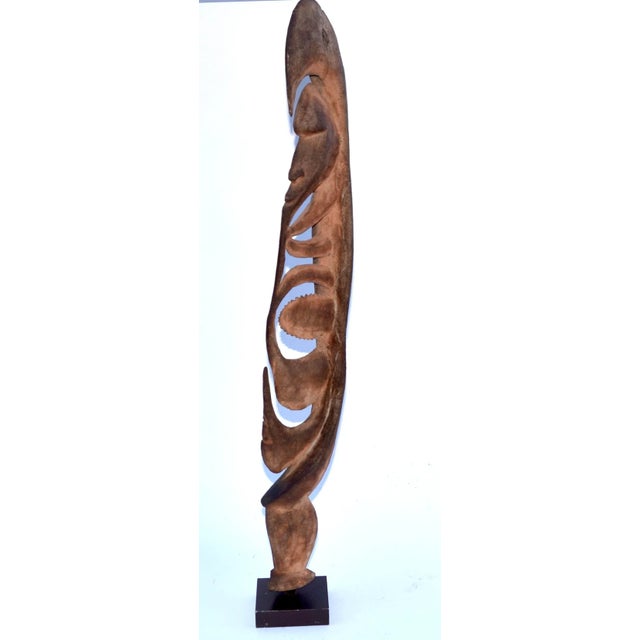 A Yipwon Hook figure from the Karawari River, east Sepik, Papua New Guinea This old carved wood one leg distinctive hook...
