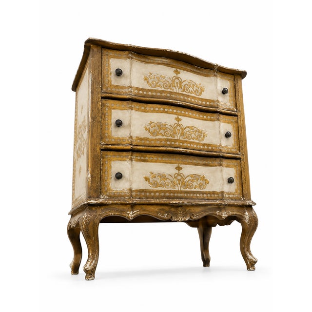 Arbalète commode in giltwood, in the Italian Renaissance style. Florentine Italian cabinet. Dimensions: Height 82 cm,...