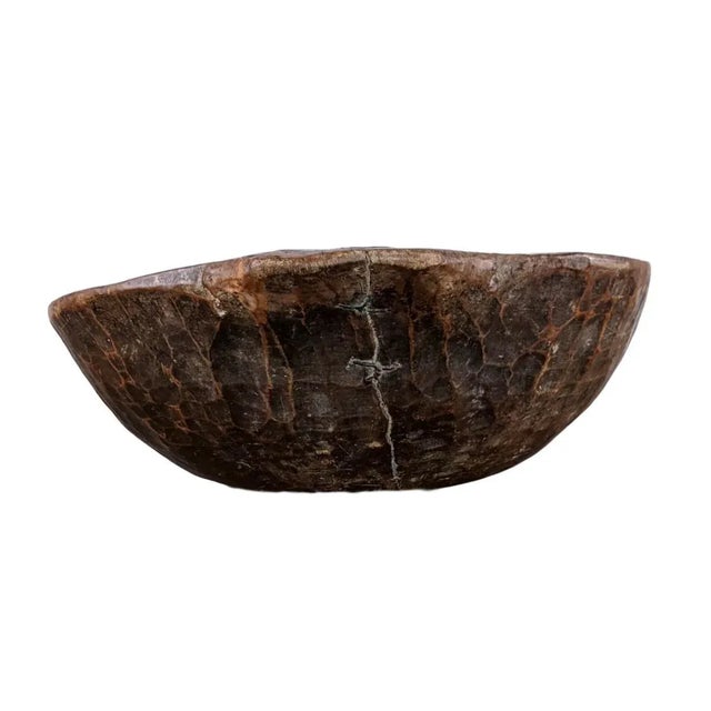 Iron nails used to keep this cherished dough bowl together reinforce its place in the home or garden. A truly charming and...