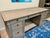 Classic executive desk crafted of meranti wood in Grey Wash finish. Crown molding and fluted trim. Excellent condition....