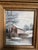 Stunning covered bridge scene in winter. It is set within its original wooden frame, which includes a burlap inner liner.