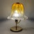 A masterpiece of light and form, ideal for enhancing bedside tables, desks, or living areas with an unmistakable touch of...