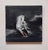 This artwork features a dynamic depiction of a white horse in motion, rendered against a dark, atmospheric background. The...