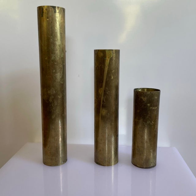 A set of 3 Danish style mid century vases from the 1960’s. The vases feature minimalist cylindrical tubes with staggering...
